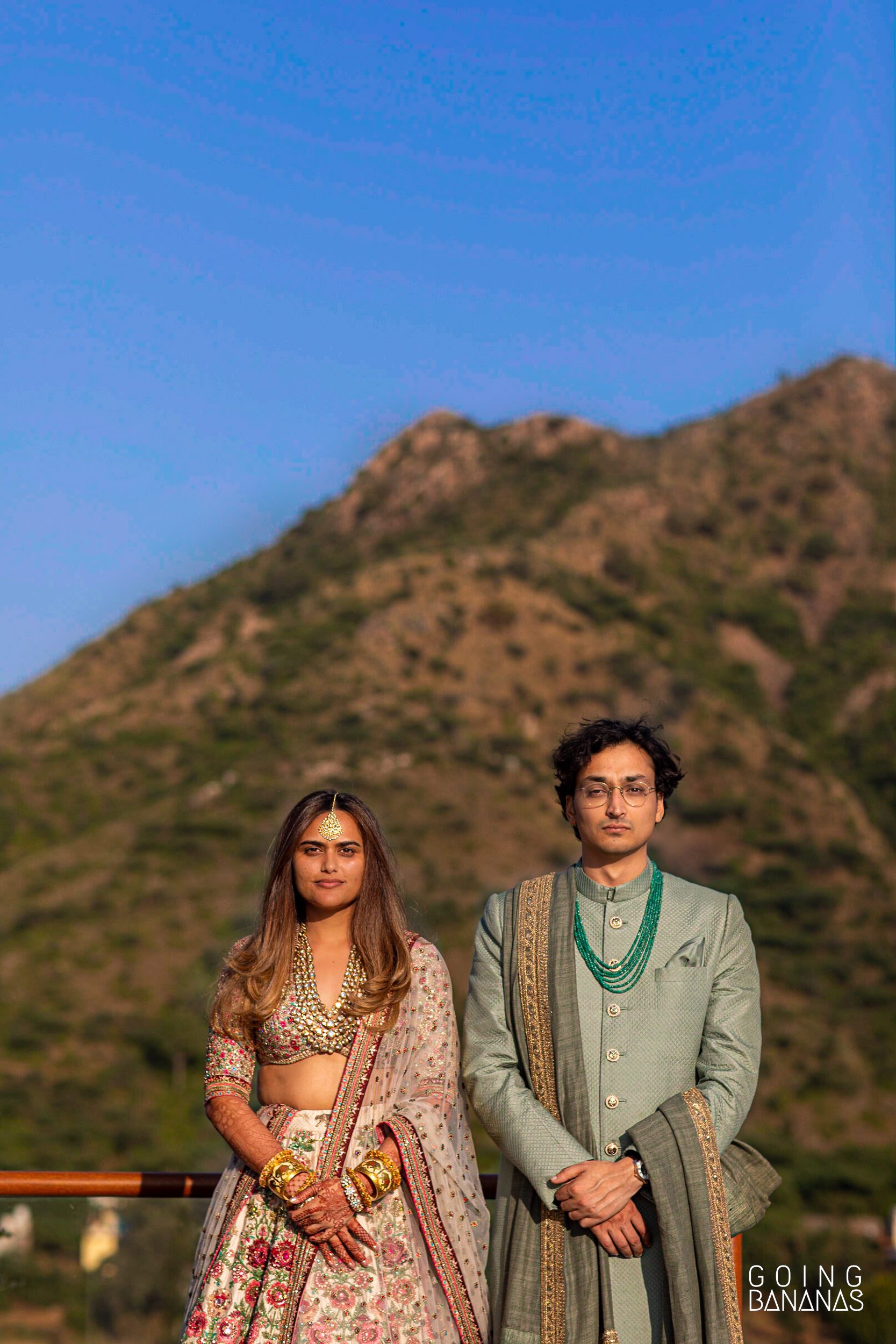 Bride and groom in Sabyasachi at Taj Aravali Udaipur