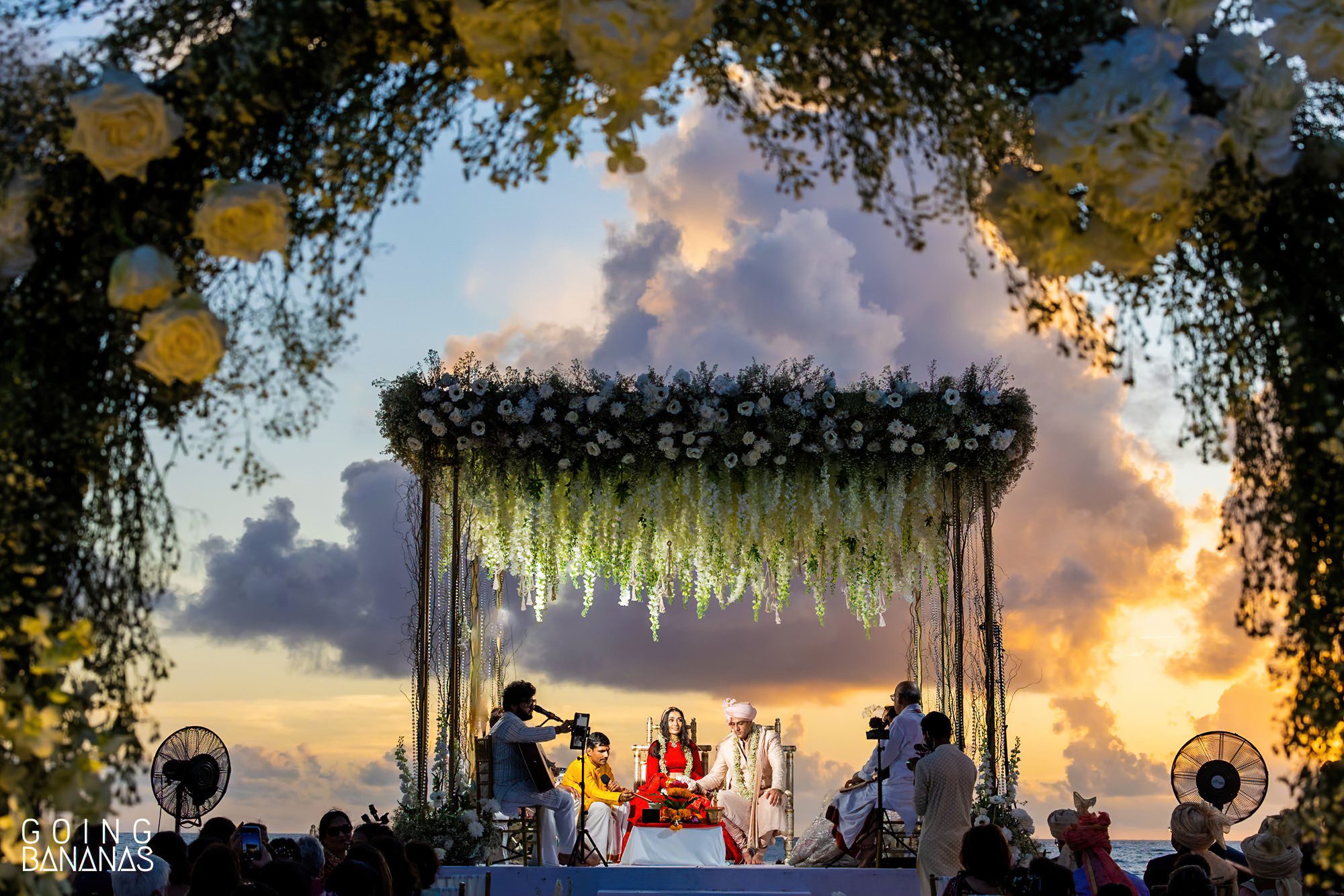 Bride and groom in the mandap at JW Marriott Khao Lak Thailand
